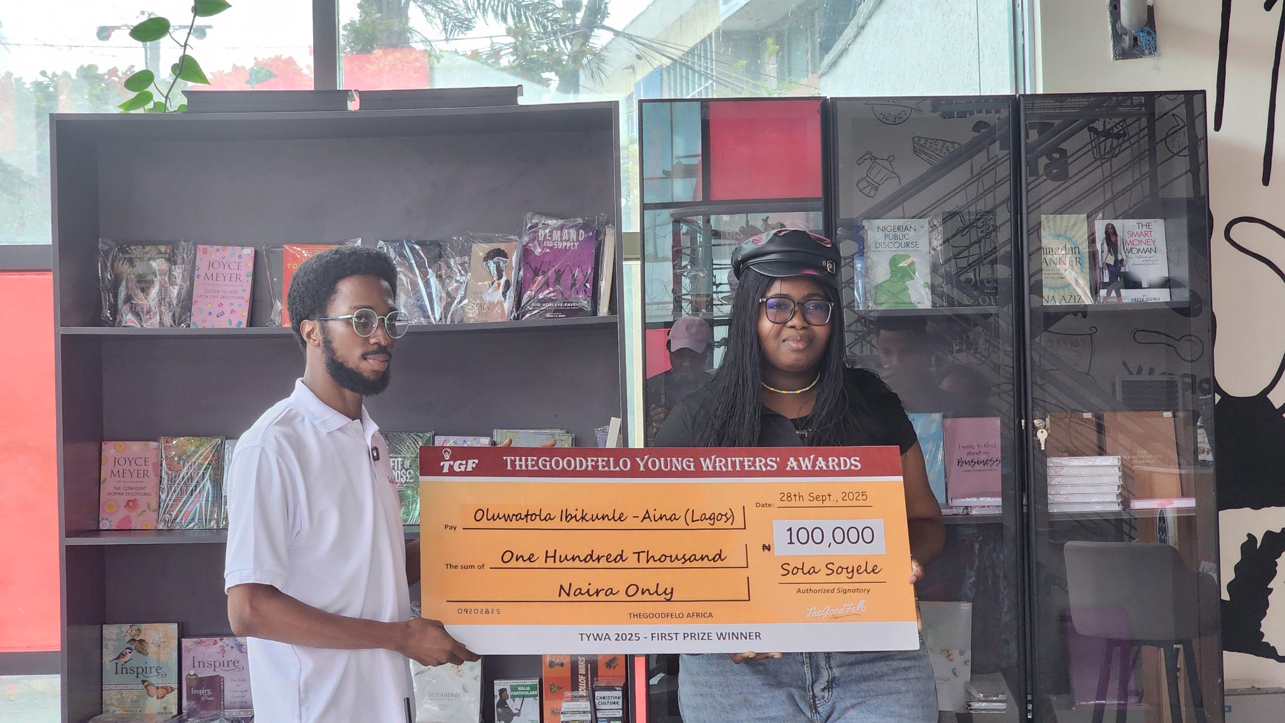 Sola Soyele Presenting Award to Oluwatola Ibikunle-Aina 2