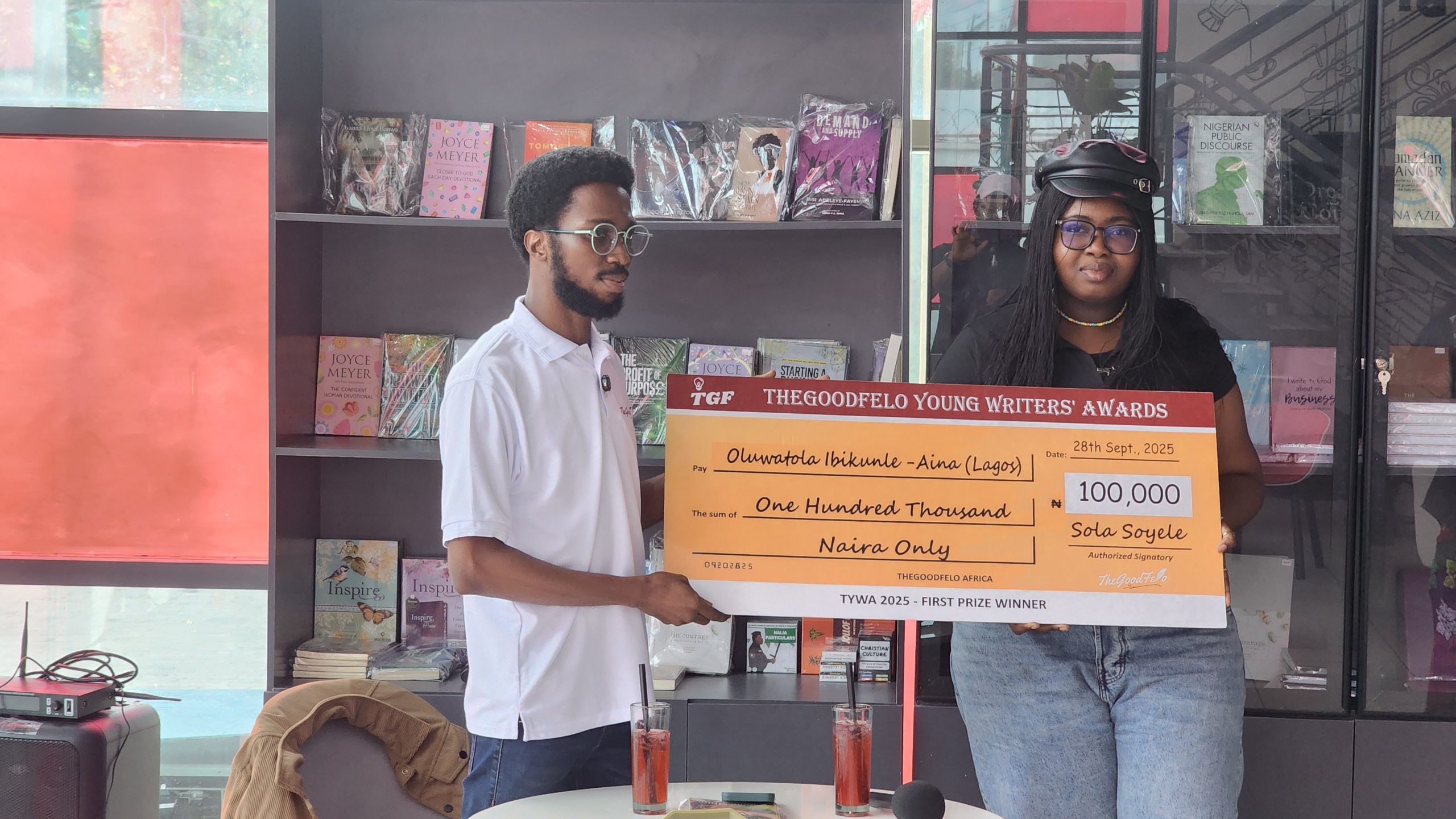 Sola Soyele Presenting Award to Oluwatola Ibikunle-Aina 3